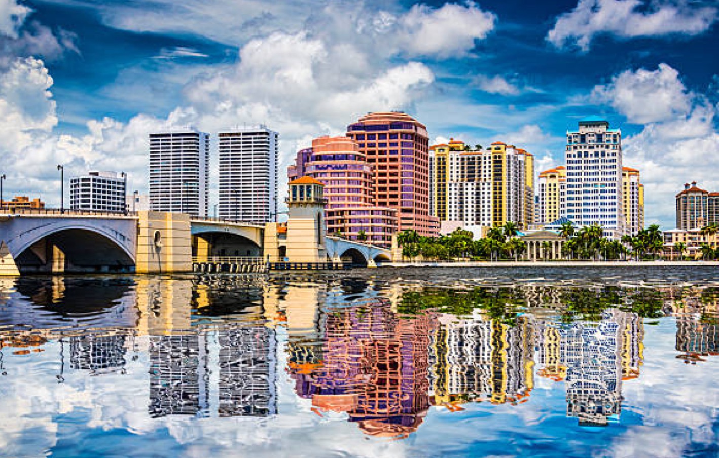 Photo of Palm Beach Gardens Florida city with water reflection.